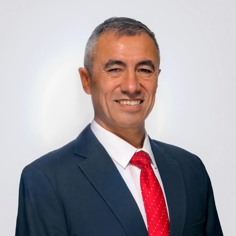 Presidente y Gerente General Carlos Bellomo